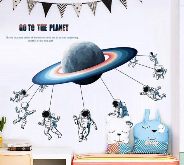 Astronauts Spinning on Planet Wall Sticker